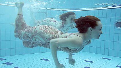 Two Dressed Beauties Underwater Netrebko And Poleshuk